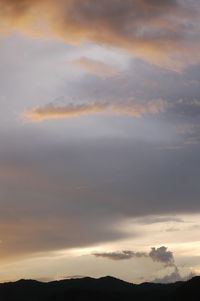 Scenic view of dramatic sky during sunset