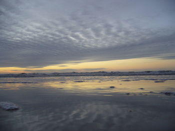 View of calm sea at sunset