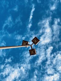 Low angle view of illuminated light against sky