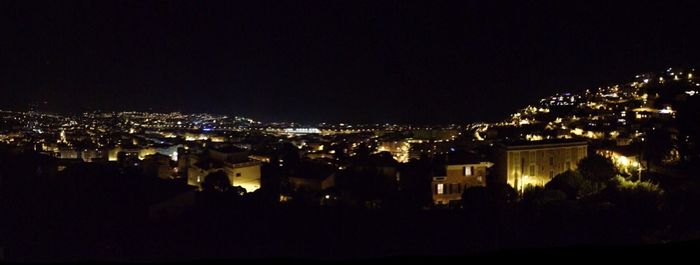 Illuminated cityscape at night