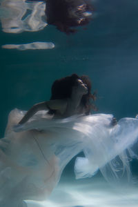 Woman swimming in pool