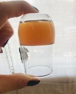 Close-up of hand holding drink