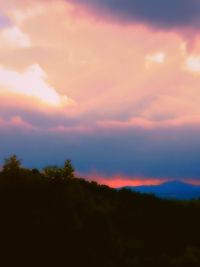 Scenic view of dramatic sky during sunset