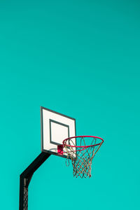 Street basketball hoop on background of vibrant sky. creative minimalistic photo. street basketball