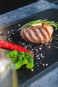 Close-up of sushi on cutting board