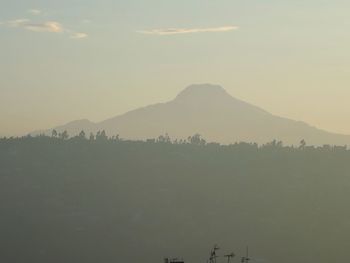 Scenic view of mountains at sunset