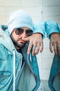 Portrait of young man wearing sunglasses