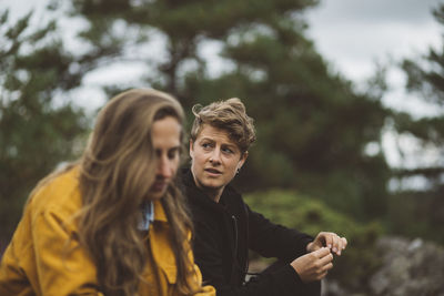 Portrait of young couple in forest