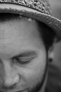 Close-up portrait of man wearing hat