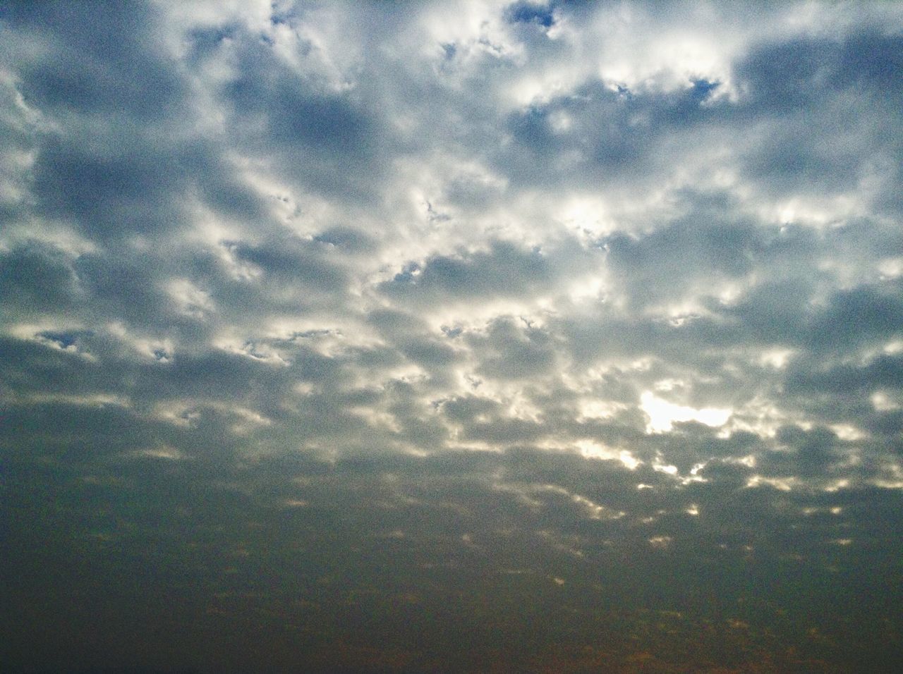 sky, cloud - sky, beauty in nature, scenics, tranquility, cloudy, tranquil scene, cloudscape, nature, sky only, backgrounds, cloud, weather, idyllic, full frame, majestic, no people, low angle view, overcast, outdoors