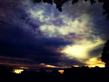 Scenic view of dramatic sky during sunset