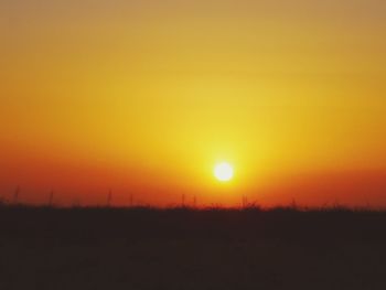 Scenic view of landscape at sunset