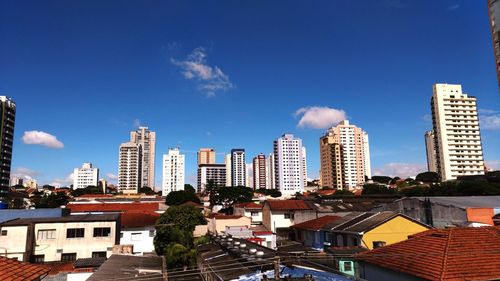 Cityscape against blue sky