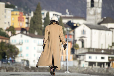 Rear view of man in city