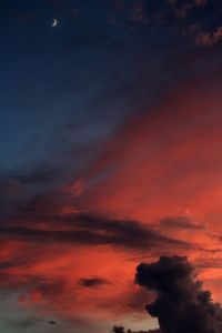 Low angle view of dramatic sky at sunset