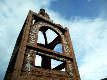 Low angle view of historical building against blue sky