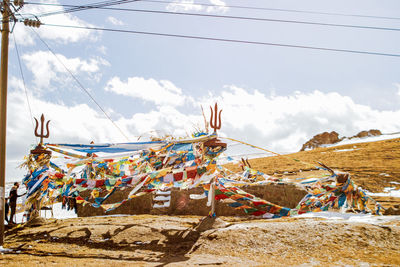 Low angle view of people on mountain