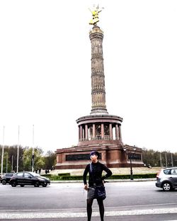 Full length of a man walking on road