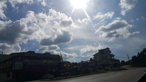 Road against cloudy sky