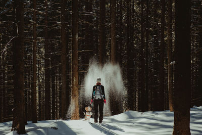 Full length of man standing on snow covered land