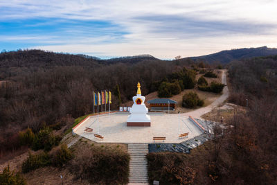 View of temple on building against sky