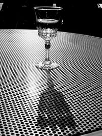 Close-up of wine in glass on table