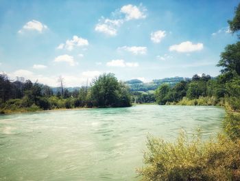 Scenic view of river against sky