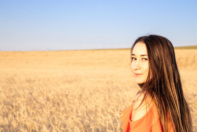 Portrait of a woman in a field