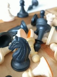 High angle view of chess pieces on table