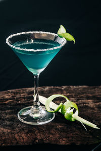 Close-up of cocktail in glass on table