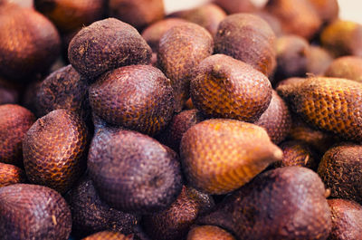 Close-up of snake fruits for sale in market
