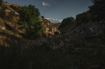 Scenic view of rocky mountains against sky