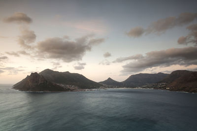 Scenic view of sea against cloudy sky