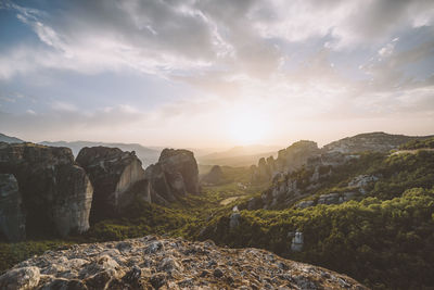 Scenic view of mountains against sky during sunset