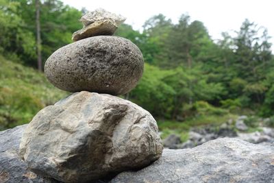 Close-up of stone stack on rock