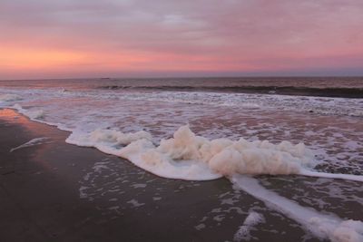 Scenic view of sea against sky at sunset