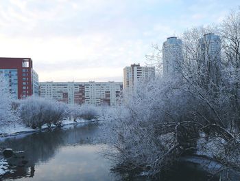 View of cityscape against sky during winter