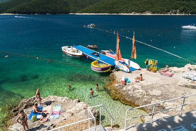 High angle view of fishing boats moored in sea