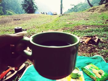 Close-up of coffee cup on table