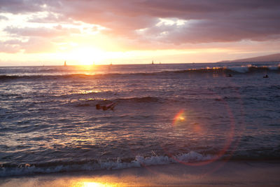 Scenic view of sea against sky during sunset