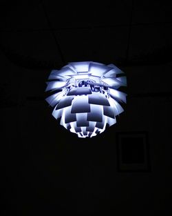 Low angle view of illuminated light bulb