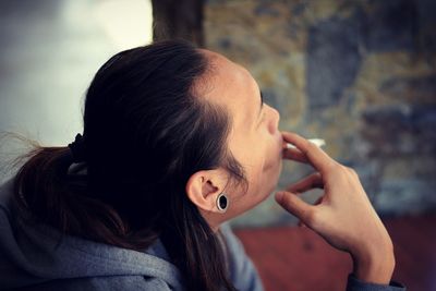 Close-up of woman using smart phone