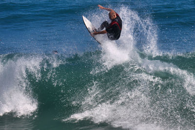 Man surfing in sea