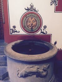 Close-up of clock on wall