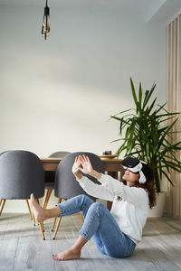 People sitting on chair at home