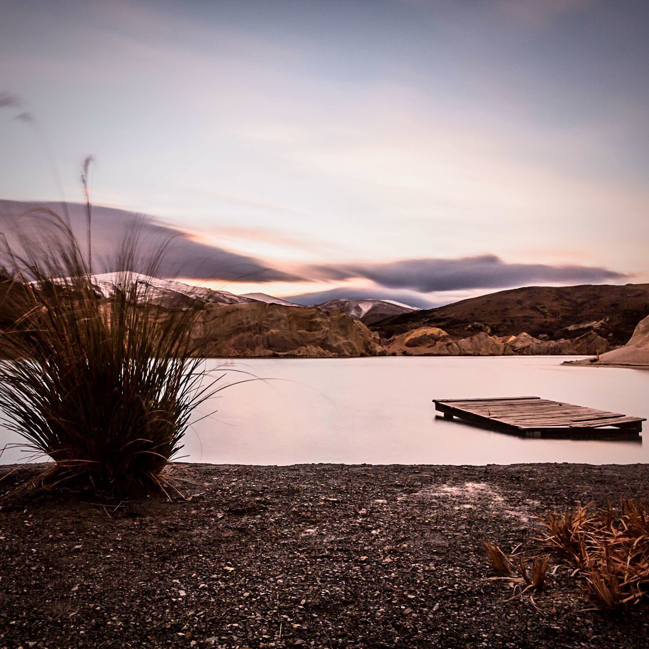 mountain, tranquil scene, tranquility, scenics, lake, sky, mountain range, beauty in nature, water, nature, winter, snow, cold temperature, landscape, cloud - sky, non-urban scene, idyllic, season, sunset, cloud