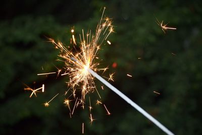 Close-up of firework display at night