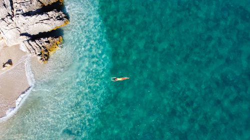 Beauty view ,girl swimming in the sea 