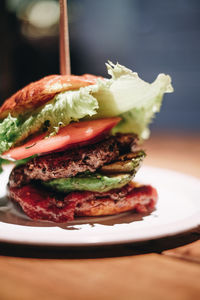 Close-up of burger in plate on table