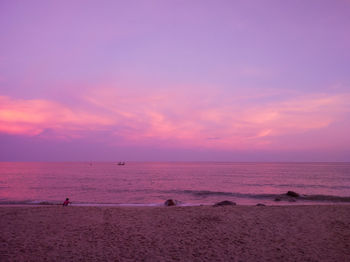 Scenic view of sea against sky at sunset